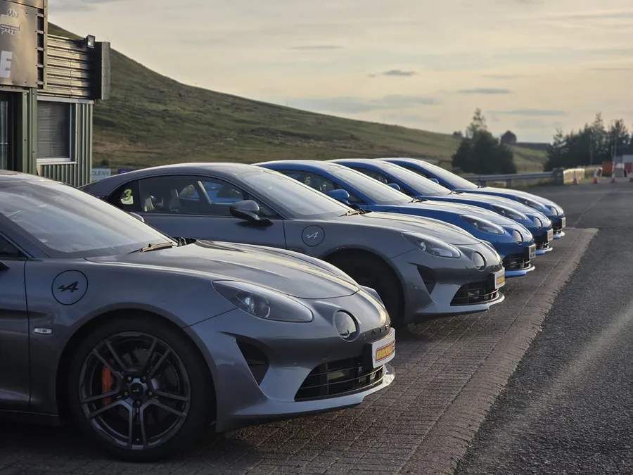 Performance cars lined up during a premium motorsport event